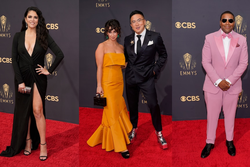 Four people on a red carpet