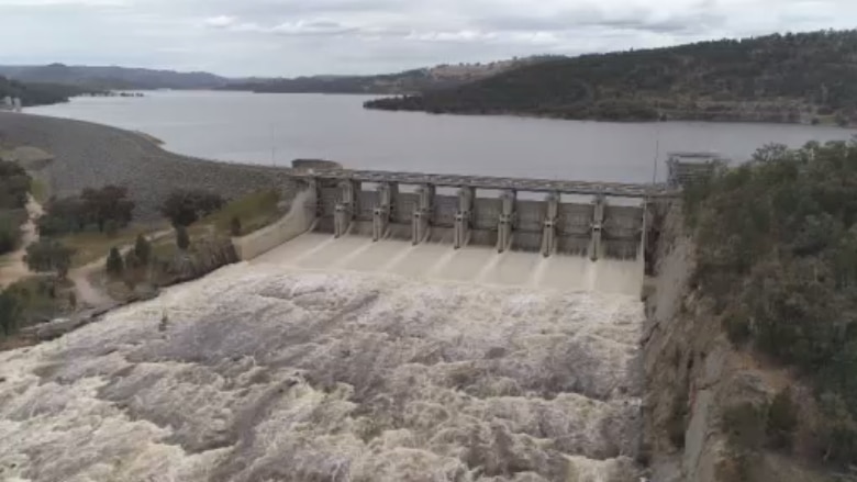 aerial view of a dam overflowing