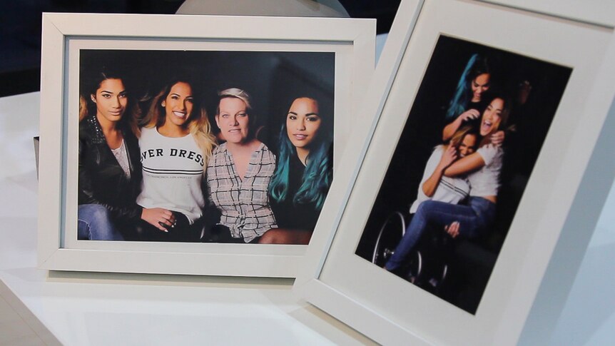 Framed photographs featuring a family of four women.