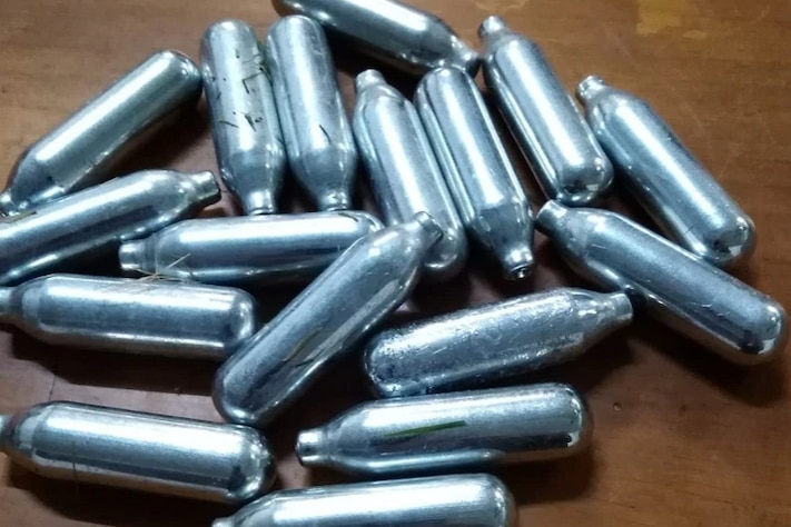 Empty silver nitrous oxide canisters 