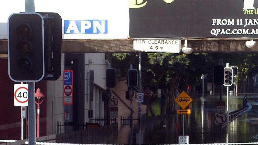 Floodwaters stretch into the distance on Melbourne Street at South Brisbane on January 13, 2011.