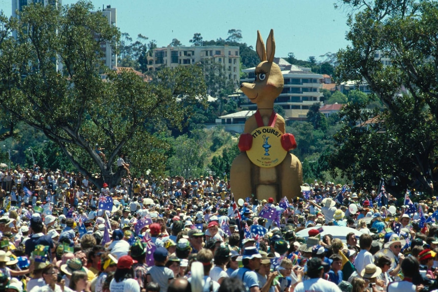 Matilda the kangaroo celebrates the 1983 America's Cup win with crowds in Perth.