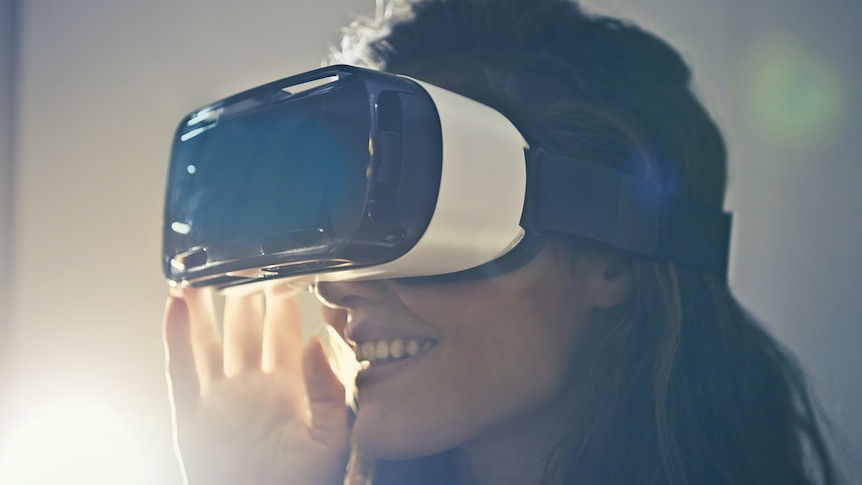 A woman wearing a VR headset