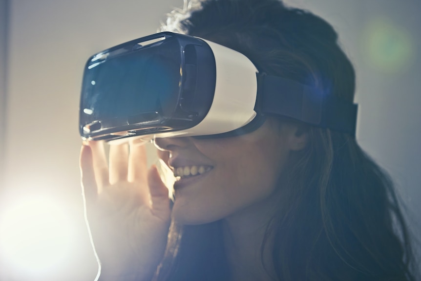 A woman wearing a VR headset