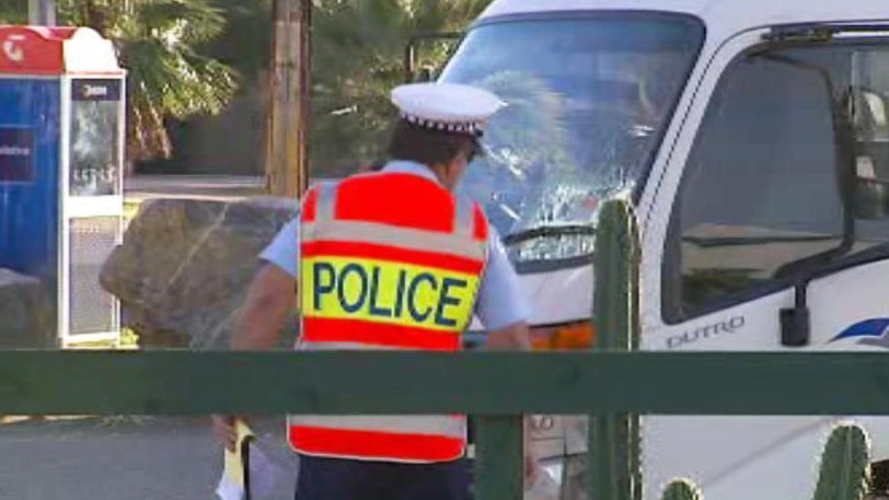 Police inspect damaged windscreen