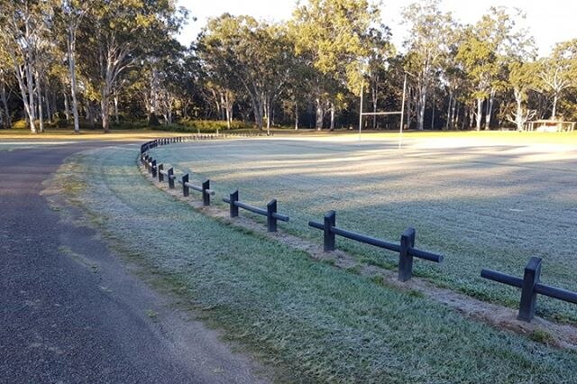 Frost covers the grass on an oval at Herberton.