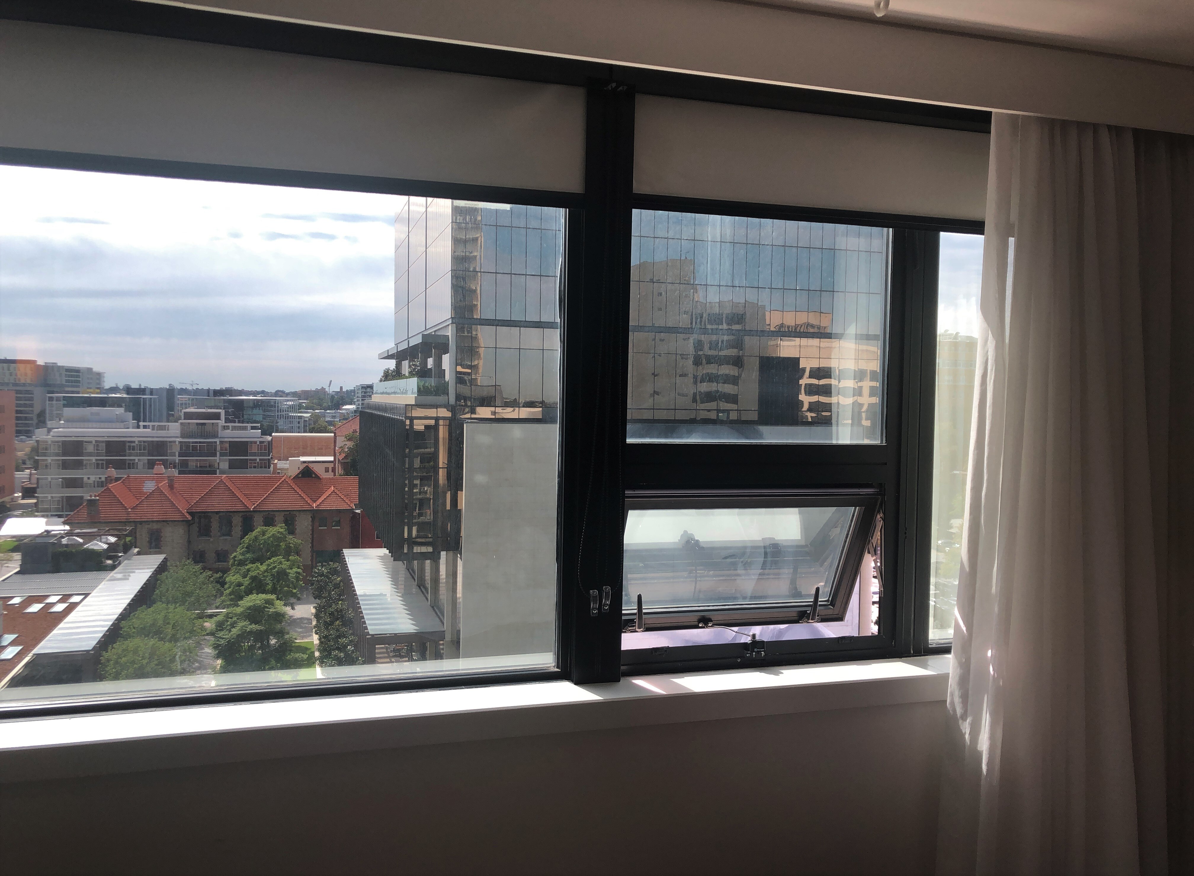 A photo of the inside of a room at the Mercure Hotel.