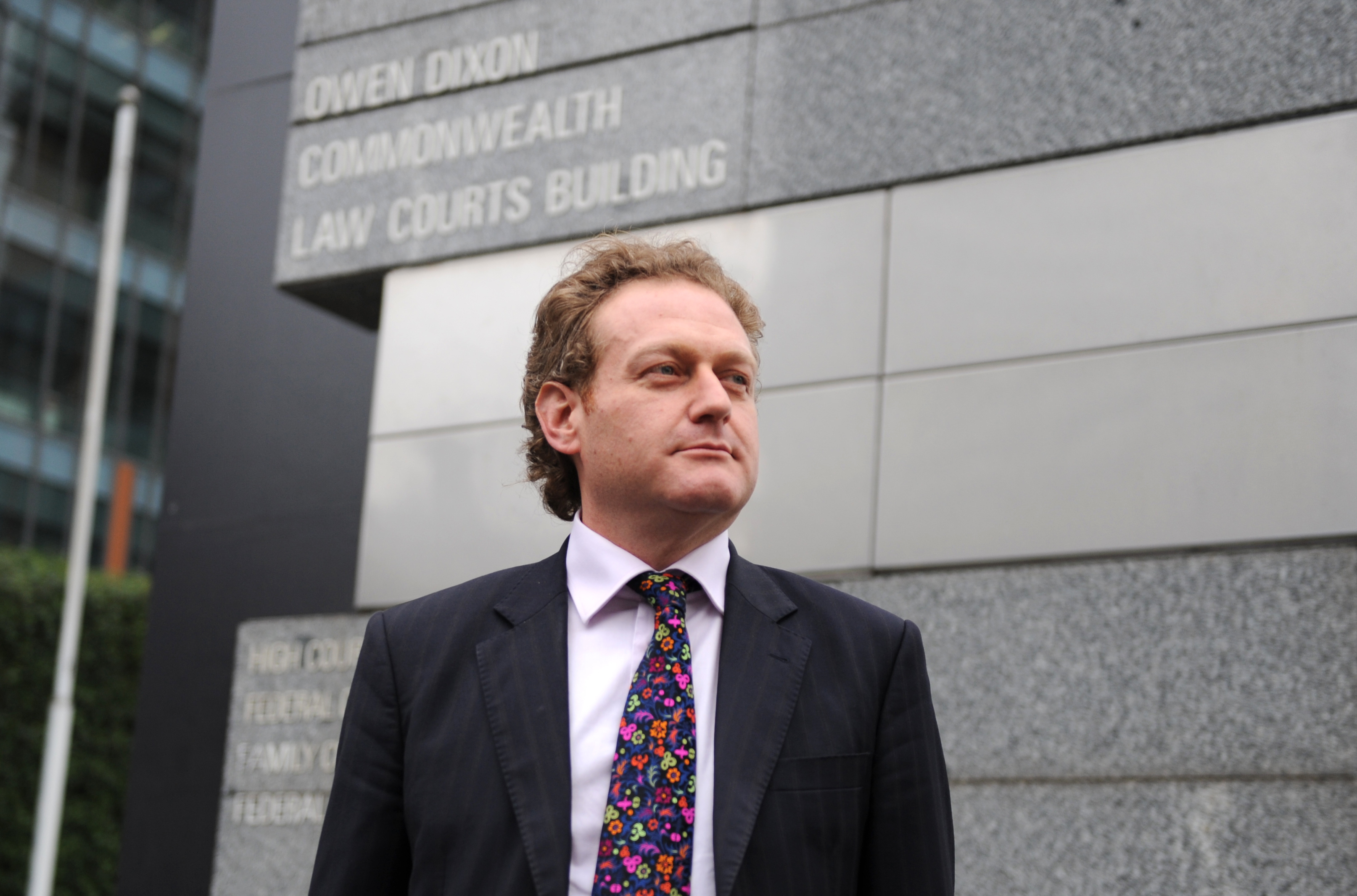 Lawyer David Manne waits outside the Federal Court in Melbourne