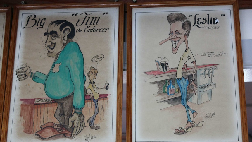 Close up photograph of caricatures on the wall of Beechwood Hotel.