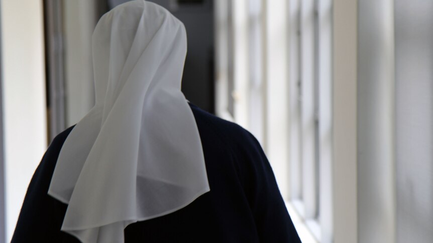 Sister Jacinta Fong walks through the halls of the Darlinghurst convent.
