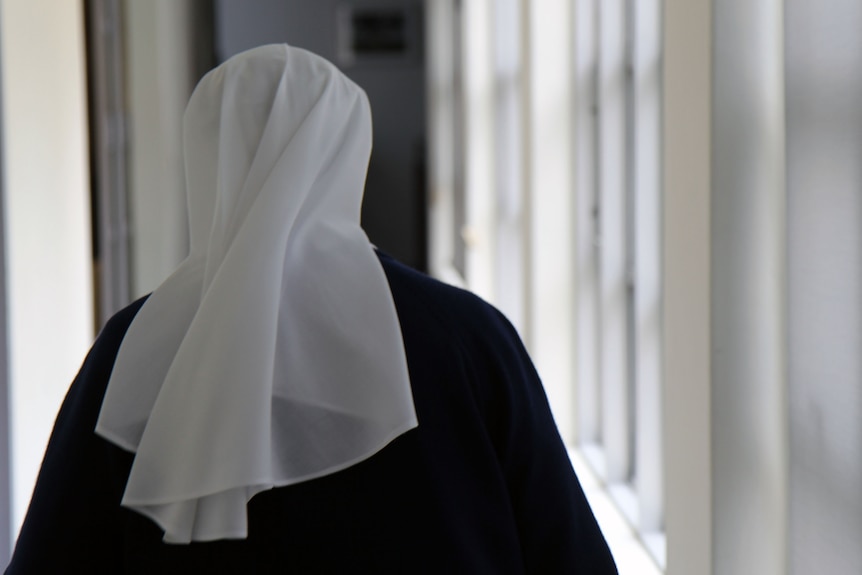 Sister Jacinta Fong walks through the halls of the Darlinghurst convent.