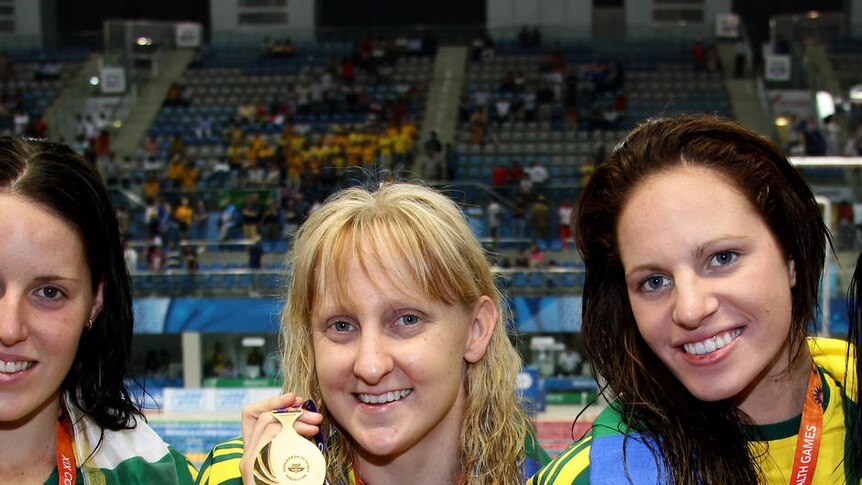 Ruling the pool...the Australian women show off yet another round of gold medals.