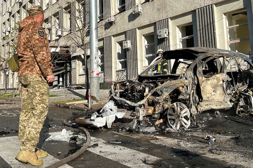 A photo of a car hit by a Russian missile in Kyiv. 