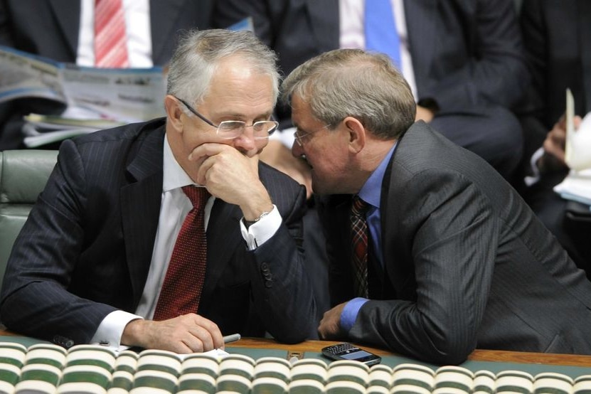 Opposition leader Malcolm Turnbull (left) speaks to emissions trading spokesman Ian Macfarlane