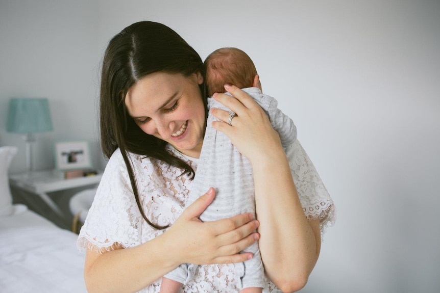 Rebecca with her son Max when he was first born.