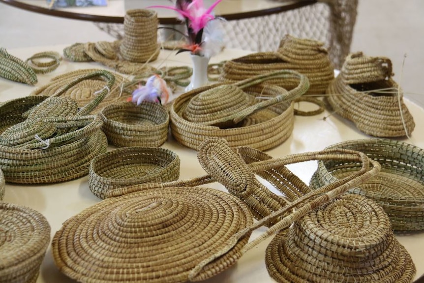 A collection of Ngarrindjeri baskets and other items woven by elder Ellen Trevorrow.