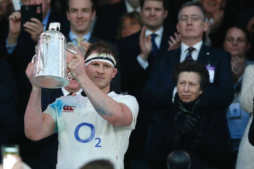 Dylan Hartley holds the Calcutta Cup after England's Six Nations rugby union win over Scotland.