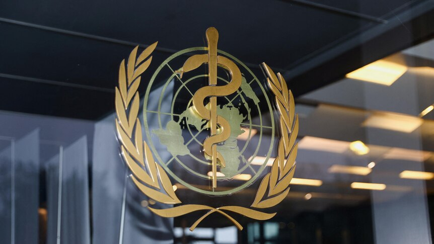 An image of the logo of the World Health Organization in Geneva.