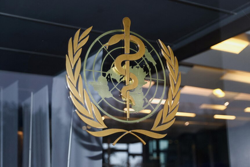 An image of the logo of the World Health Organization in Geneva.