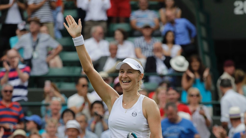 Ekaterina Makarova of Russia celebrates defeating Caroline Wozniacki at Wimbledon.