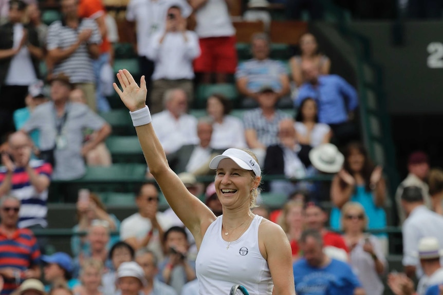 Ekaterina Makarova of Russia celebrates defeating Caroline Wozniacki at Wimbledon.