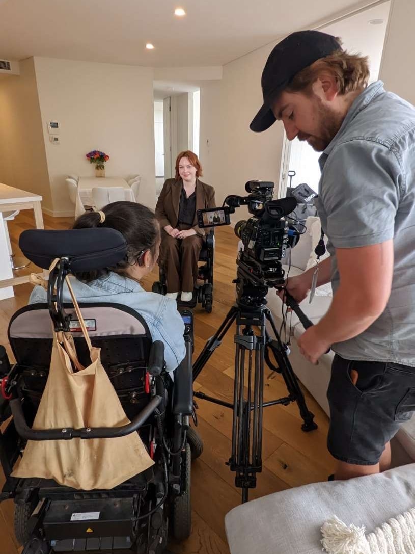 Elly Desmarchelier interviewing Sophie for a TV story