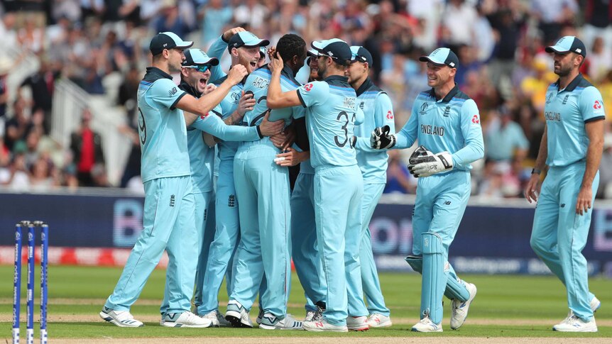 England players gather around Jofra Archer to congratulate him on a job well done.