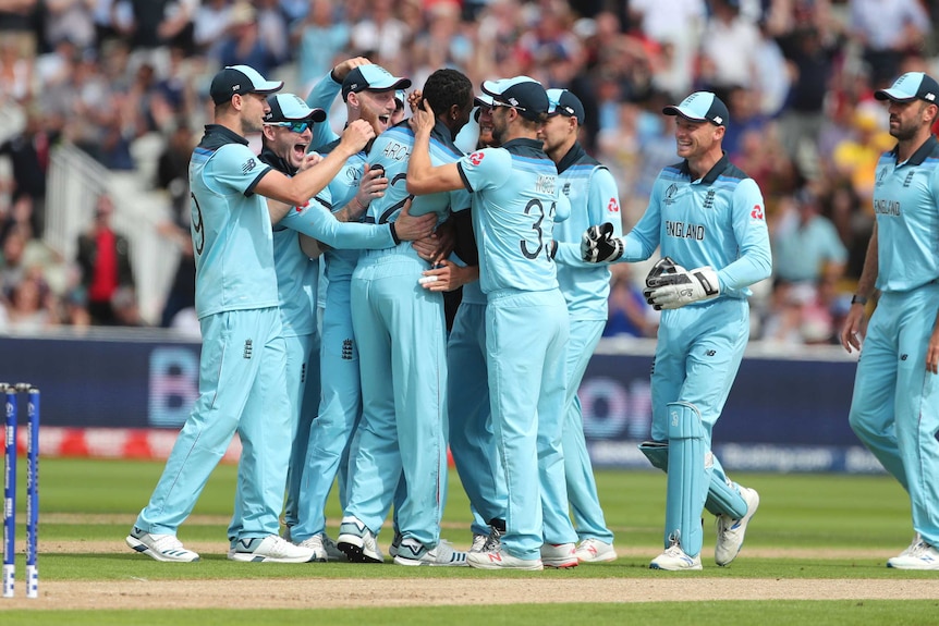 England players gather around Jofra Archer to congratulate him on a job well done.