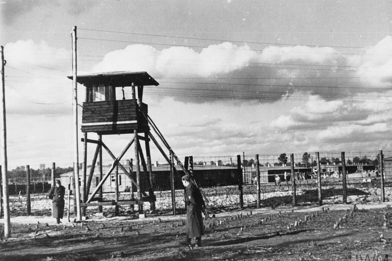 German guards on duty by one of the watch towers at Stalag Luft III, Sagan.