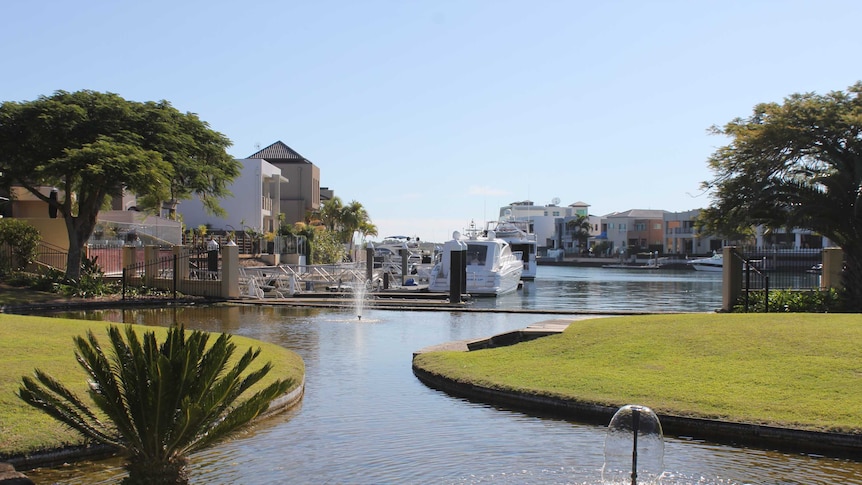 Scene on Gold Coast of luxury Sovereign Islands canals, mansions and fountains