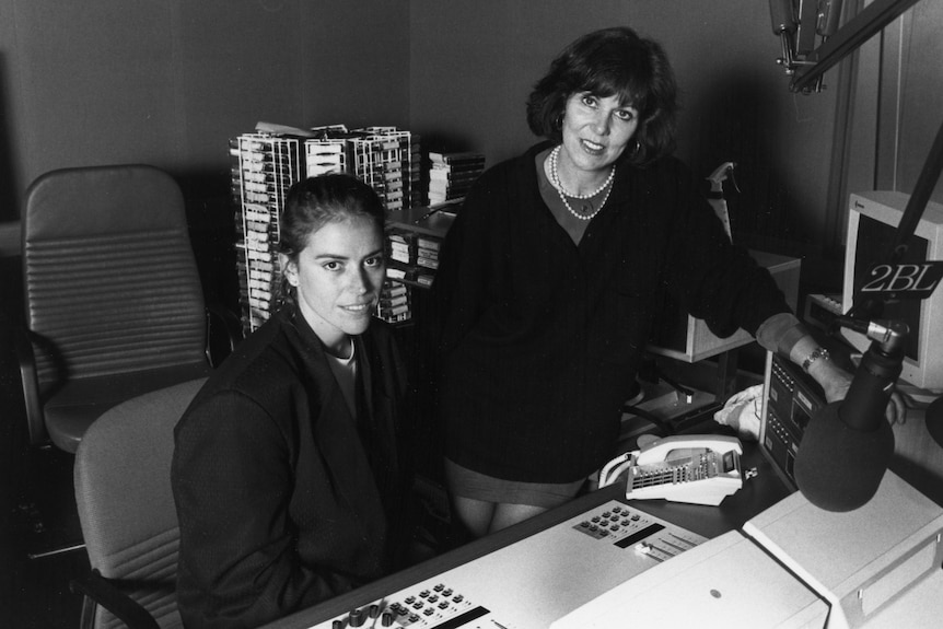 Two women in a radio tudio. 