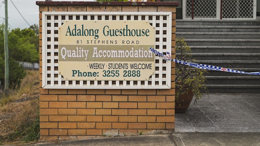 Exterior sign of Adalong Guest house.