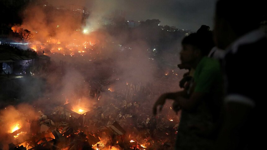 fire rages in a slum in Dhaka