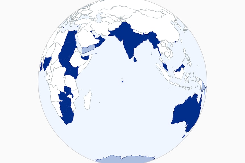 A globe has numerous countries highlighted, including Australia, India and large swathes of Africa.