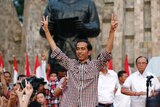 Joko 'Jokowi' Widodo gestures during rally