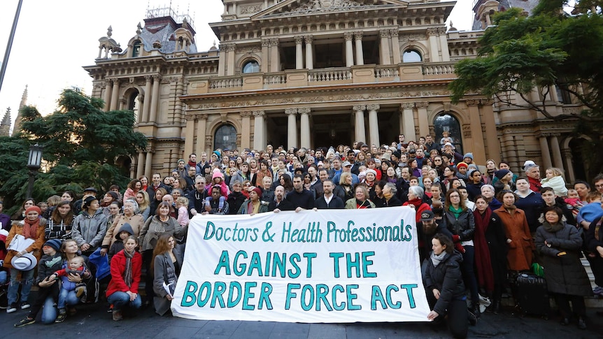 Doctors and health workers stage protest at Sydney Town Hall against the Border Force Act