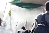 Smoke fills the stage following an explosion