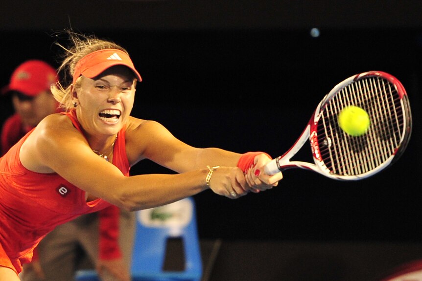 Caroline Wozniacki dispatched Australia's Anastasia Rodionova in two quick sets.