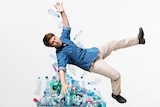 Craig Reucassel, suspended in the air over plastic bottles in a trolley and an ibis in the bottom right-hand corner