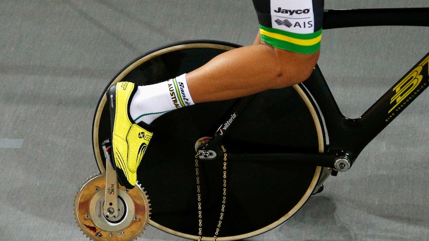 Luke Davison of Australia rides with his pedal and crank broken
