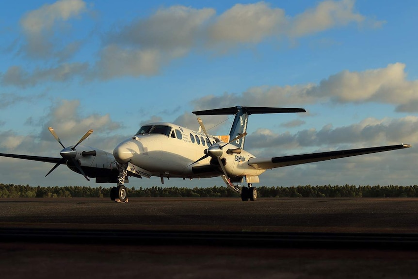 A photo of a fixed-wing aircraft on a runway.