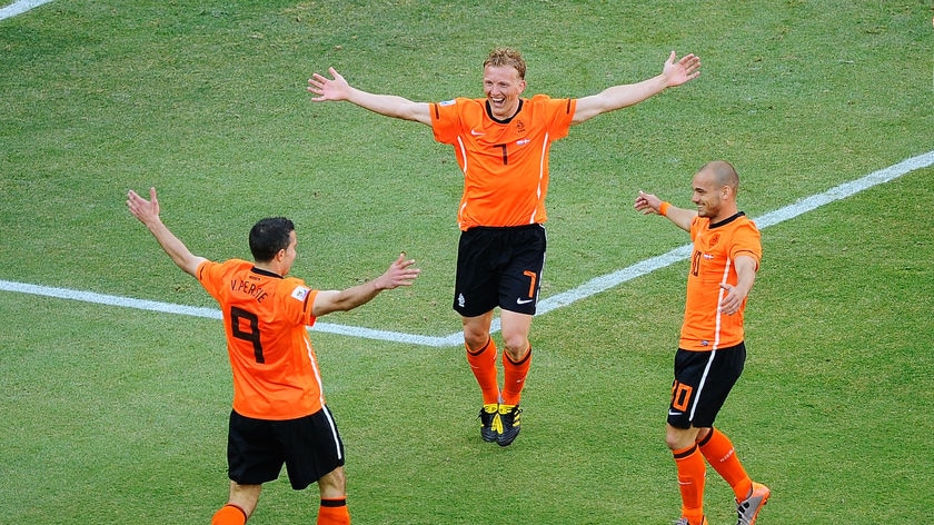 Fortunate goal: The Netherlands celebrates Daniel Agger's own goal.