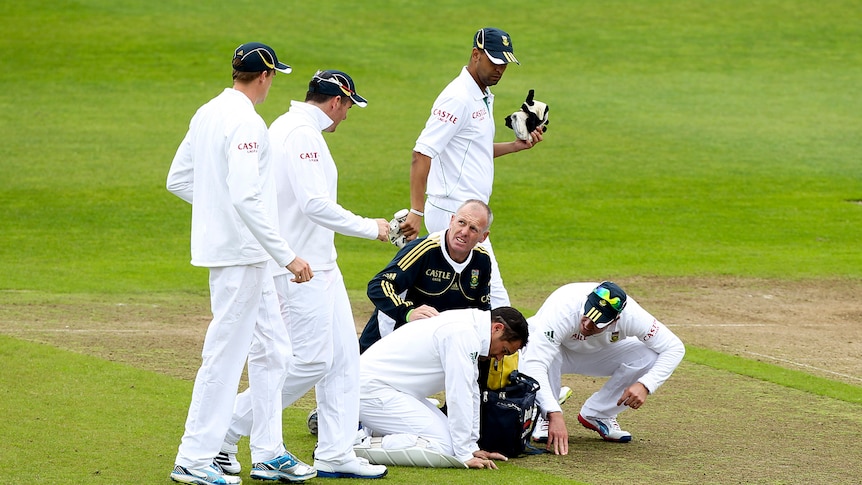 Mark Boucher is treated after a bail hit him in the eye.