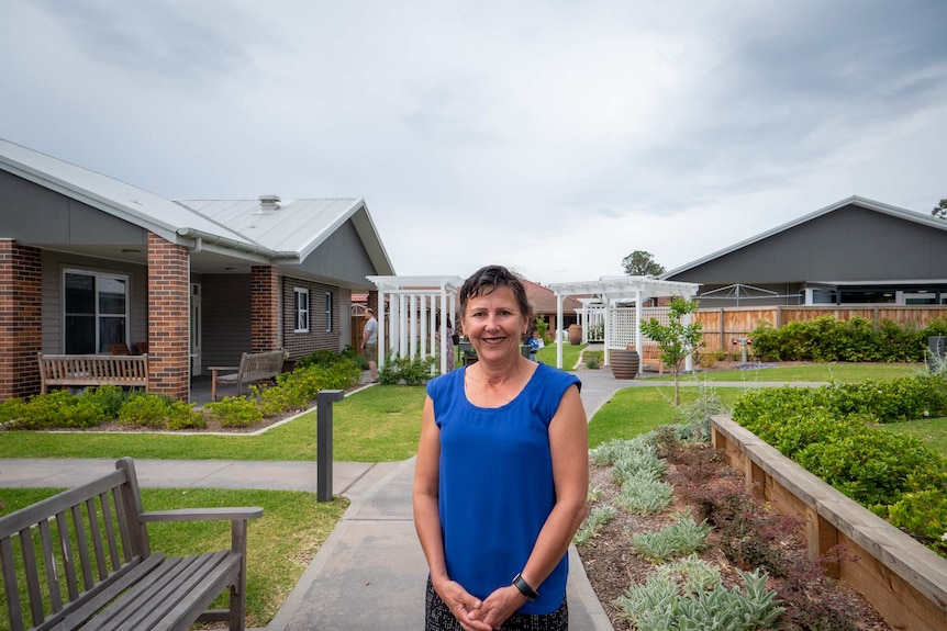Angela Raguz standing in a residential care village operated by HammondCare.