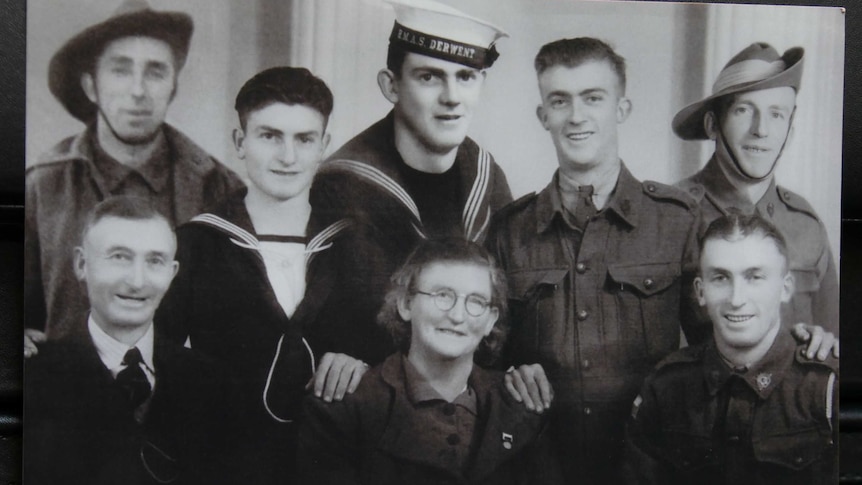 Teddy Sheean poses with other members of the navy.