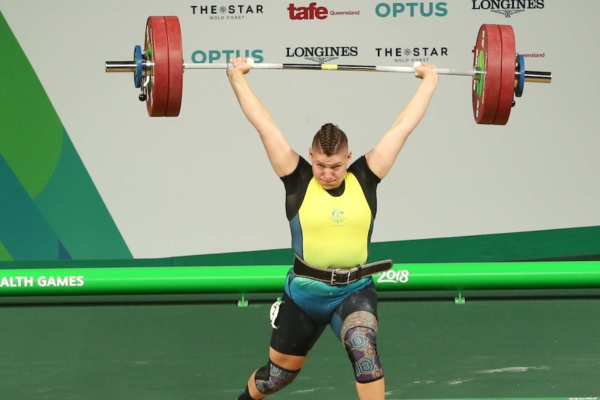 Australia's Kaity Fassina successfully completes her second clean and jerk