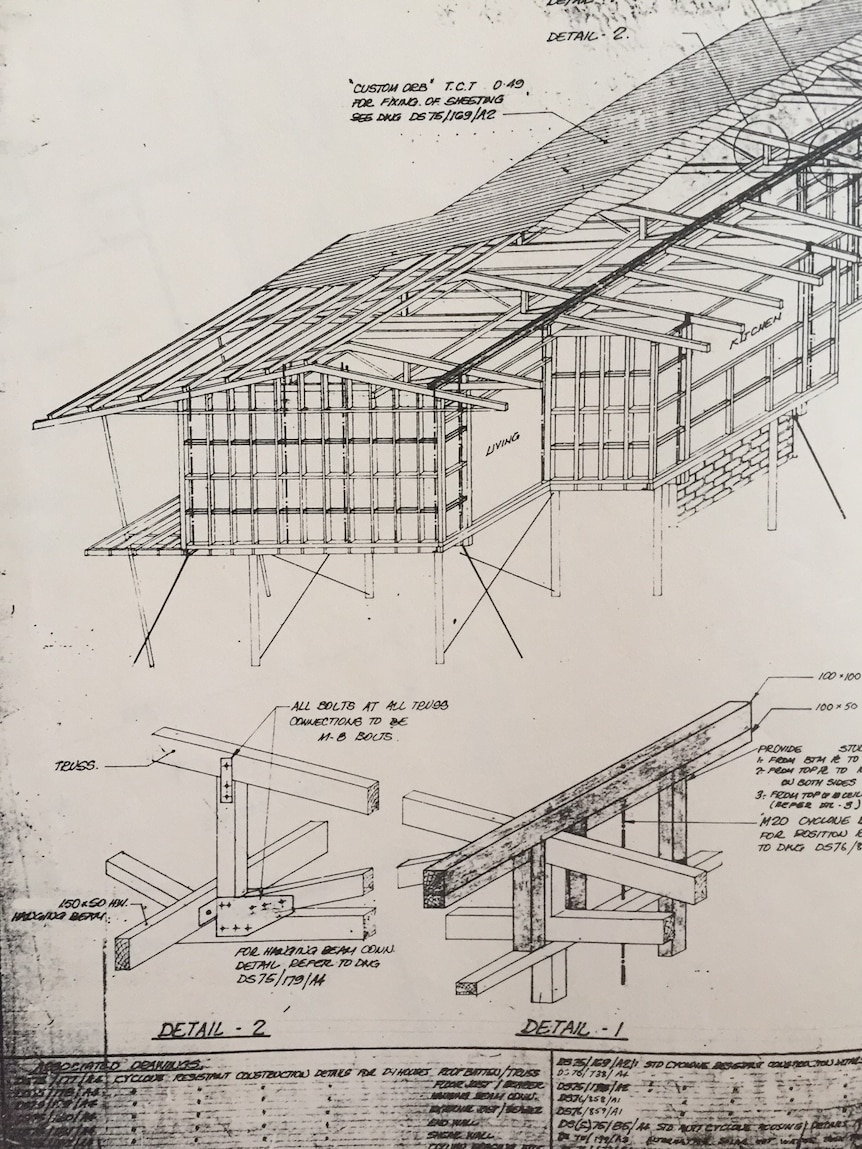 Paper plans for an elevated house.