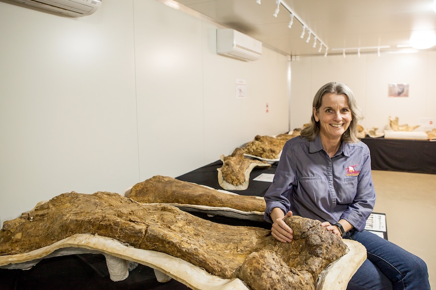 Robyn Mackenzie with Cooper's fossilised bones