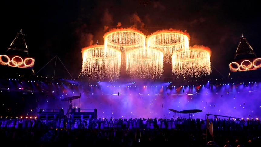 Fireworks fall from the Olympic rings during the opening ceremony of the London 2012 Olympic Games.