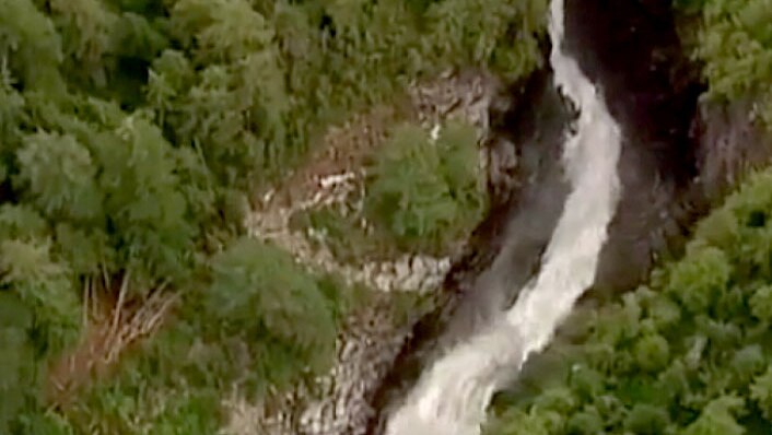 An aerial view of a treacherous waterfall near Harrison Lake in British Columbia.